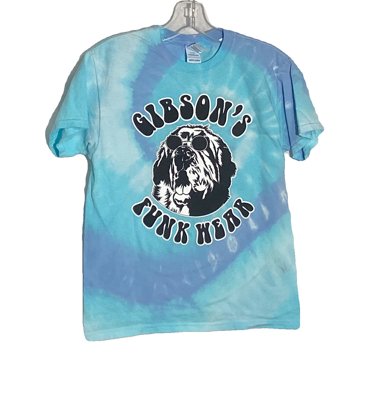 Alt text: "Bahama Breeze blue tie-dye T-shirt from Gibsons Funk Wear featuring a graphic of a shaggy dog wearing sunglasses with the text 'GIBSON'S FUNK HEAR' in bold letters."