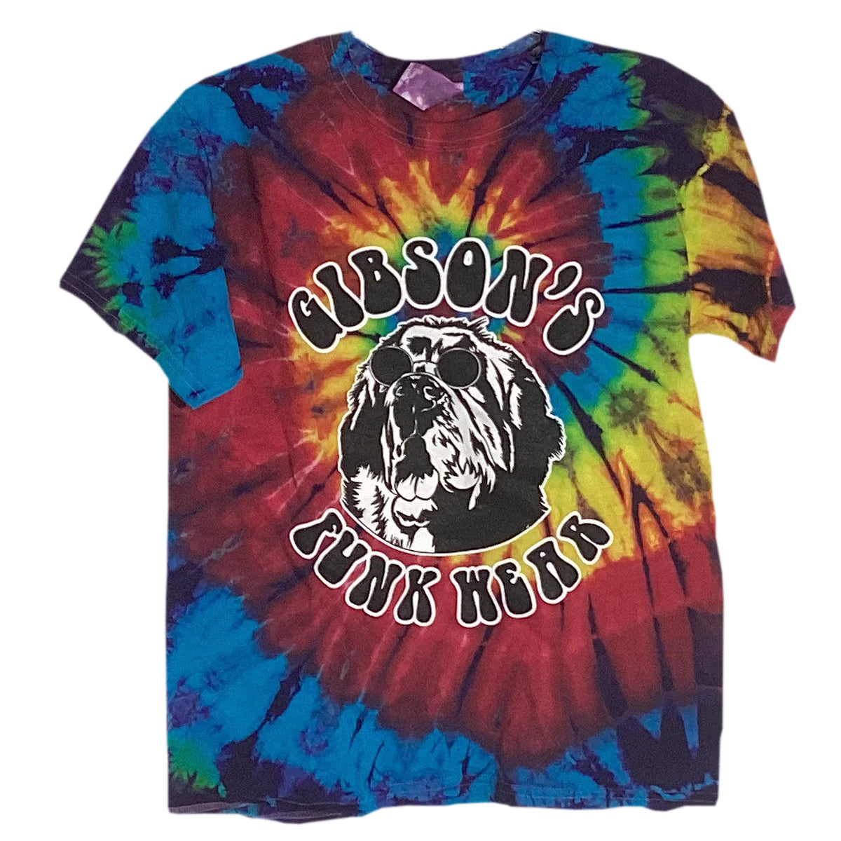 Alt text: "Flashback" Gibson's Funk Wear tie-dye T-shirt in vibrant red, blue, and green colors featuring a central graphic of a shaggy dog wearing sunglasses with the text 'Gibson's Funk Wear' encir